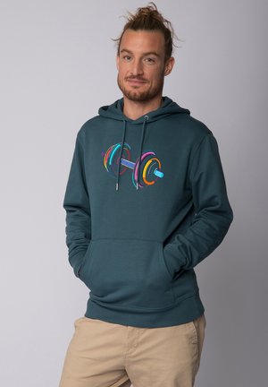 Hoodie en coton turquoise avec un graphique coloré d'haltères sur le devant. Il a une capuche avec cordon de serrage et une poche kangourou.