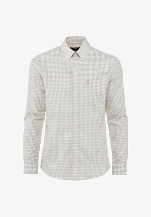 Męska koszula zapinana na guziki w jasnym wzorze w kratkę; materiał jest biały z beżowymi i jasnoniebieskimi kwadratami. Posiada stożkowy kołnierzyk oraz kieszeń na piersi.