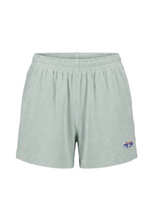 Lys grønn frottéshorts med elastisk midjebånd og liten rektangulær logo på venstre ben nær kanten.