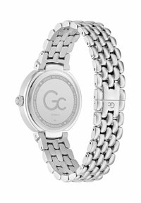 Ceas din oțel inoxidabil argintiu, cu carcasă rotundă, brățară legată și un finisaj neted și lustruit. Dispune de mecanism elvețian și cristal de safir.