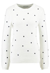 Weißer, gestrickter Pullover mit langen Ärmeln, Rundhalsausschnitt und verstreuten schwarzen Punkten.