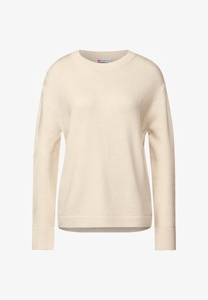 Lys cremefarvet, langærmet sweater med rund hals, ribbede manchetter og kant. Blødt strikket tekstur med subtile sømdetaljer på ærmerne.