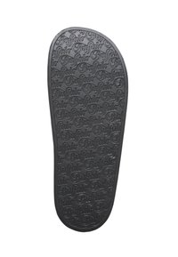 Semelle d’une chaussure noire avec motif de texte "Buffalo" répété embossé pour l’adhérence et l’identification de la marque.