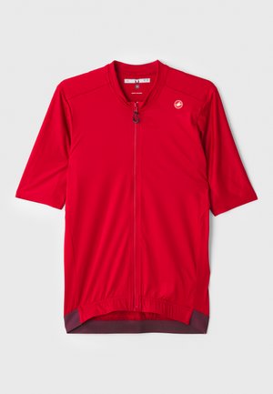 Jersey de ciclism roșu cu mânecă scurtă, cu fermoar până la un sfert, textură ribbed și tiv în contrast de culoare maronie. Logo pe pieptul stâng.