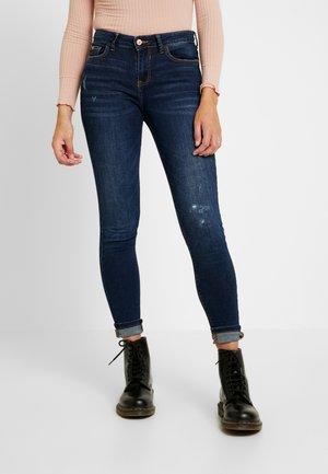 Jeansy Skinny Fit