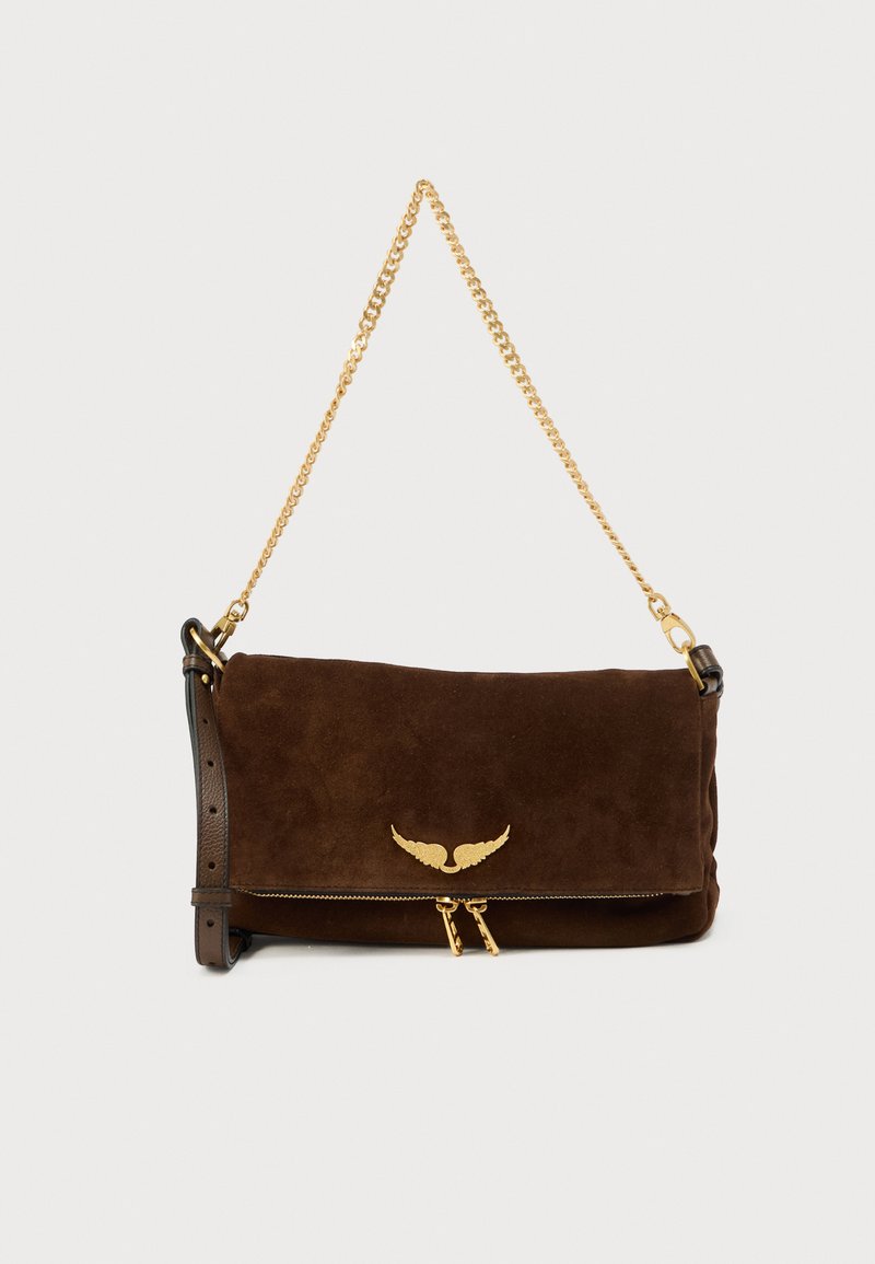 Brown suede handbag with a gold winged logo, zip closure, and a detachable gold chain strap. Features black leather accents.