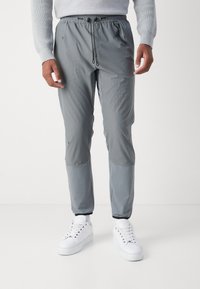 BOSS Tracksuit bottoms - dark beige