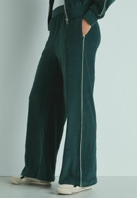 Next JOGGERS - Treniņtērpa apakšdaļas - green