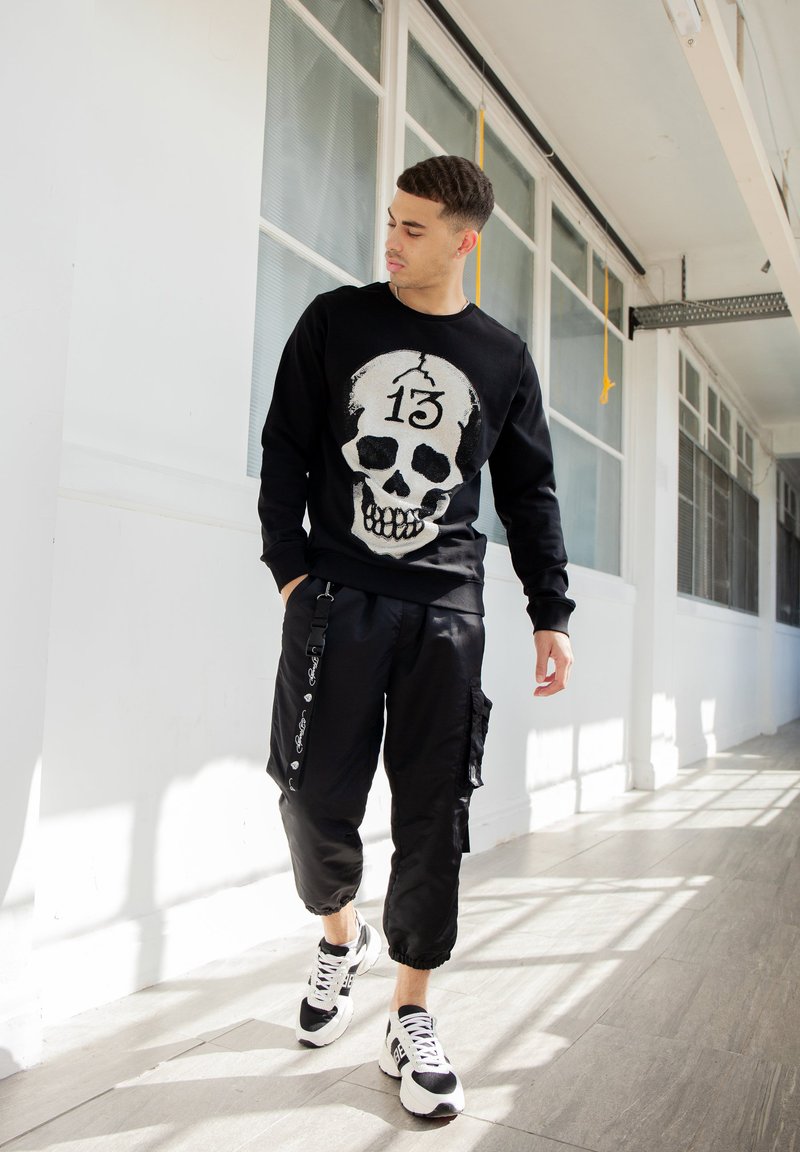 pantalones ed hardy hombre