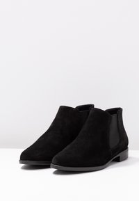 Tamaris Botines bajos - black