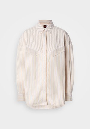 Camicia a righe con bottoni, in colori beige chiaro e crema, vestibilità rilassata, maniche lunghe e due tasche sul petto con pattina.