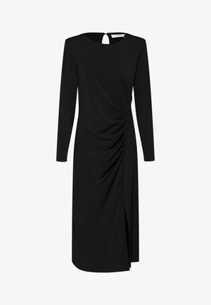 Melna garo piedurknu kleita ar apaļu izgriezumu un atslēgas caurumu aizmugurē. Iezīmē sānu ruche detaļas un šķēlumu kreisajā pusē. Gluda auduma.