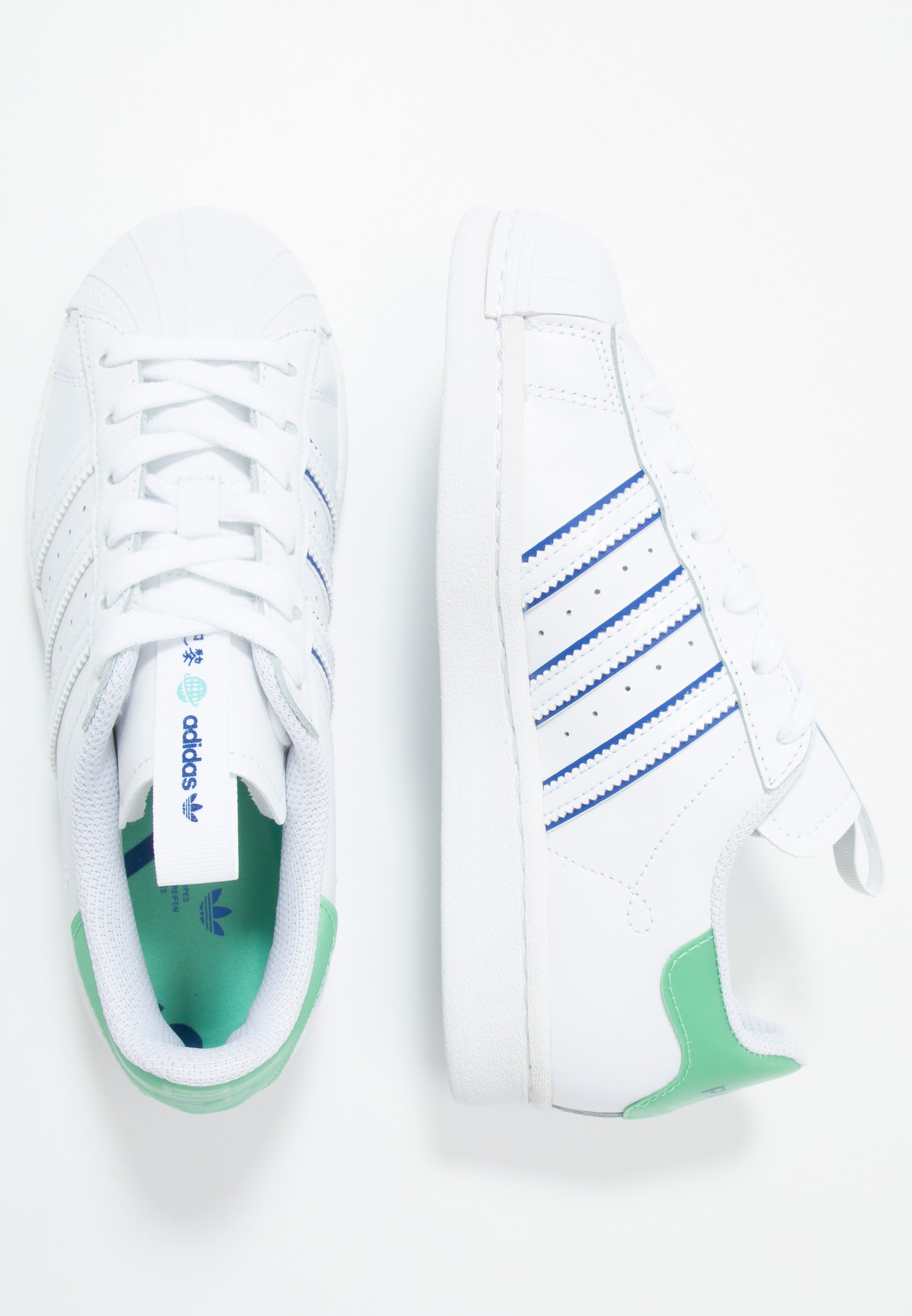 green adidas superstar trainers