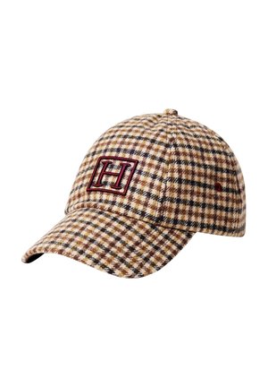 Baseball cap with brown and beige plaid pattern and a red embroidered "H" inside a square on the front panel.