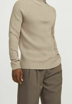 Stickad tröja - beige
