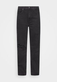Svarta denimjeans med tapered passform, med slitna detaljer på knäna, fem fickor och dragkedja med knappstängning.