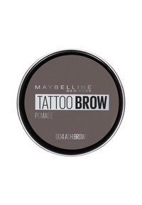 Pomata per sopracciglia Tattoo di Maybelline in una confezione rotonda, colore castano scuro cenere, texture liscia, con scritte argentate e bianche sul coperchio.
