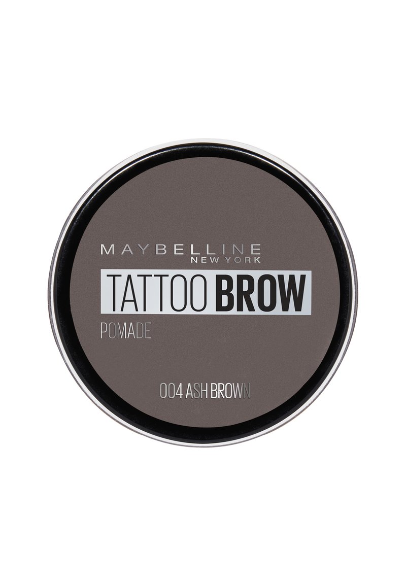 Pomata per sopracciglia Tattoo di Maybelline in una confezione rotonda, colore castano scuro cenere, texture liscia, con scritte argentate e bianche sul coperchio.