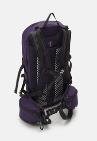Purple backpack with mesh panels, padded straps, and a top handle. Features adjustable side pockets and sturdy plastic hardware.