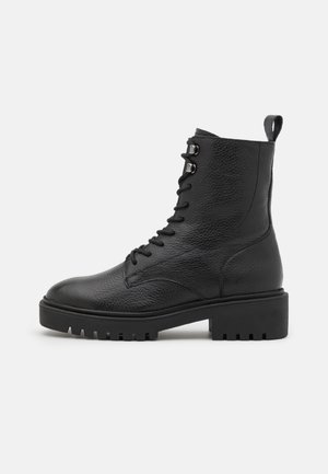 Bottines à lacets - black