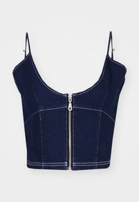 Temno moder denim top s kratkimi naramnicami. Ima sprednji zadrgo in kontrastno belo šivanko. Čista, prilega se silhueti z oblikovanim dizajnom.