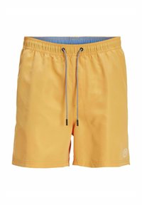 Shorts de bain jaunes avec une taille élastique et un cordon de serrage. Possède une texture lisse, des coutures latérales et un accent de logo sur l'ourlet.