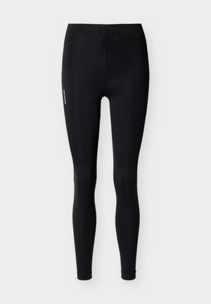 Μαύροι αθλητικοί κολάν ολόκληρου μήκους με ψηλή μέση και μικρό λευκό λογότυπο στο πάνω αριστερό μηρό, σε απλό φόντο.