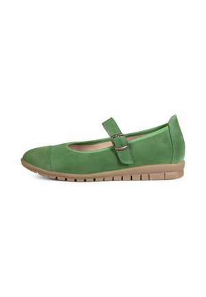 Zapato Mary Jane de ante verde con una sola correa y hebilla, suela de goma marrón acolchada y puntera redondeada.