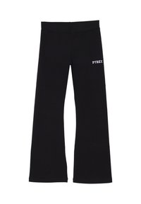 Pantaloni neri a zampa d'elefante realizzati in misto cotone. Presentano una vita elasticizzata e il logo bianco "PYREX" sul lato sinistro.