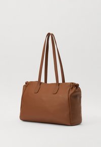 Brown leather tote bag with smooth texture, dual handles, and cinched top. Rectangular shape with minimalistic design and no visible hardware.