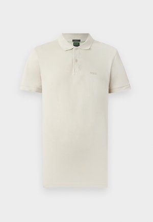 Poloshirt van lichtbeige katoen, met een klassieke kraag, korte mouwen, een knoopsluiting met twee knopen en een subtiel geborduurd logo op de borst.
