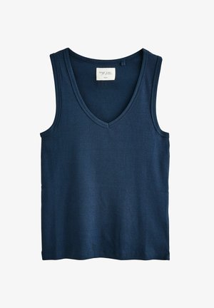 Tumman sininen röyhelöistä tank top -paita, jossa on V-kaula-aukko, pehmeä tekstuuri ja hihaton muotoilu, täydellinen kerrospukeutumiseen tai lämpimille säille.