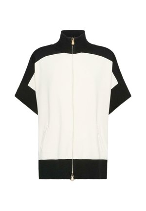 Giacca con zip e maniche corte, collo alto, a blocchi di colore in nero e bianco, con tasche frontali e orlo e collo a costine.