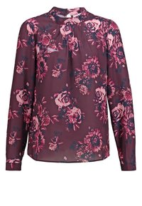 Blouse florale bordeaux à manches longues, col montant, en tissu léger et transparent avec des motifs botaniques roses et bleu foncé.