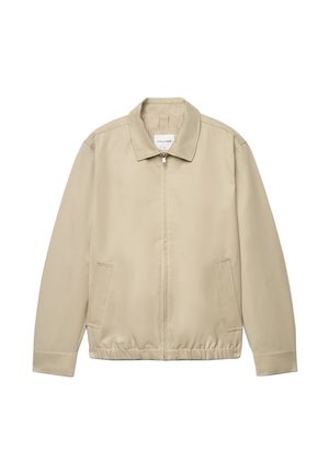 Beige Reißverschlussjacke mit Kragen, zwei Seitentaschen, langen Ärmeln und elastischem Saum, flach auf weißem Hintergrund liegend.
