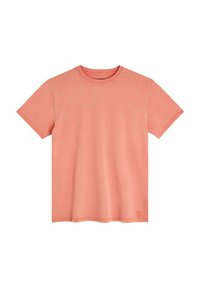 T-shirt à manches courtes en coton corail, avec un col rond et une coupe décontractée. Inclut un discret détail de logo à l'ourlet.