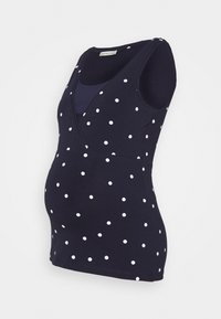 Těhotenský top bez rukávů v námořnické modři s bílými puntíky, s vrstveným výstřihem ve tvaru V.