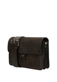 Dark brown suede and leather crossbody bag with adjustable strap and metal buckle, front flap, and small logo detail on closure.