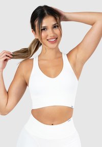 Smilodox AMAZE PRO RACERBACK BH - Sport-bh met medium support - creme