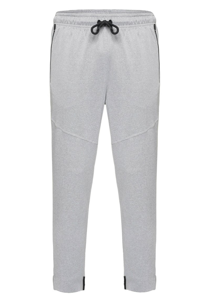 Lys grå sweatpants med snoretræk i taljen, sidelommer og sorte detaljer ved anklerne; lavet af blødt, tekstureret stof.