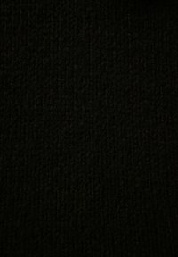 Stickad tröja - black