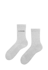 Szürke bordázott zoknik, fekete "LA MANIA" felirattal, puhán textilekészítve, sima felülettel. Bokáig érő dizájn.