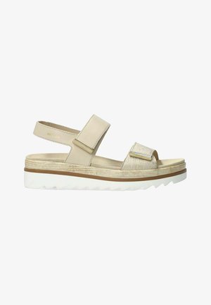 Sandale beige à bout ouvert avec brides réglables, une bande avant texturée, une semelle rembourrée et une semelle extérieure plateforme blanche rainurée.