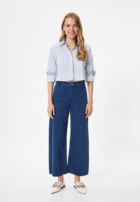 Koton WIDE LEG - Flared Jeans - dark blue