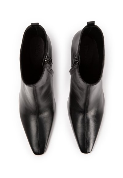 Black leather ankle boots with a pointed toe, side zipper closure, and smooth texture; sleek design with minimal stitching detail.