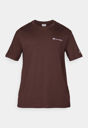 Braunes Baumwoll-T-Shirt mit kurzen Ärmeln, Rundhalsausschnitt und kleinem weißen Champion-Logo auf der linken Brust und dem Ärmel. Klassischer Schnitt.