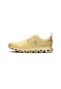 Yellow athletic shoe with a textured upper, featuring a lace closure, branding on the side, and a cushioning sole with cutouts.