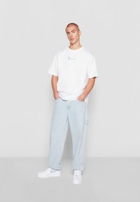 Karl Kani RETRO BAGGY WORKWEAR - Blugi loose fit - bleached blue