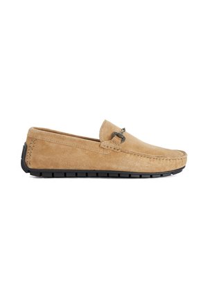 Tan suede loafer with black rubber sole and silver horsebit detail on top, side view on white background.
