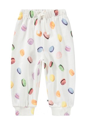 Pantaloni bianchi per bambini piccoli con vita e polsini elastici, decorati con motivi colorati di macaron in tonalità pastello.
